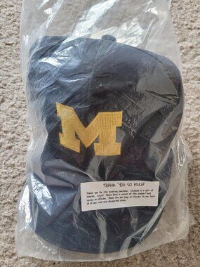 New, never worn Michigan Wolverines polyester baseball cap with Velcro fastener